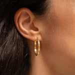 18K gold Eternity Hoops worn — artisan handcrafted fine earrings — White sapphire— Sun Rae