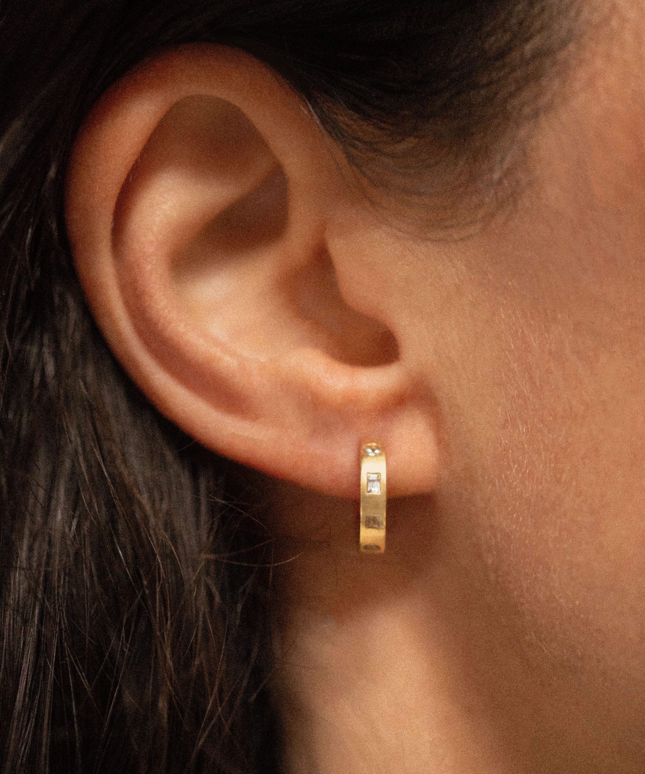 18K gold eternity huggie earrings worn— handcrafted gold huggies white sapphire— artisan jewelry — Sun Rae