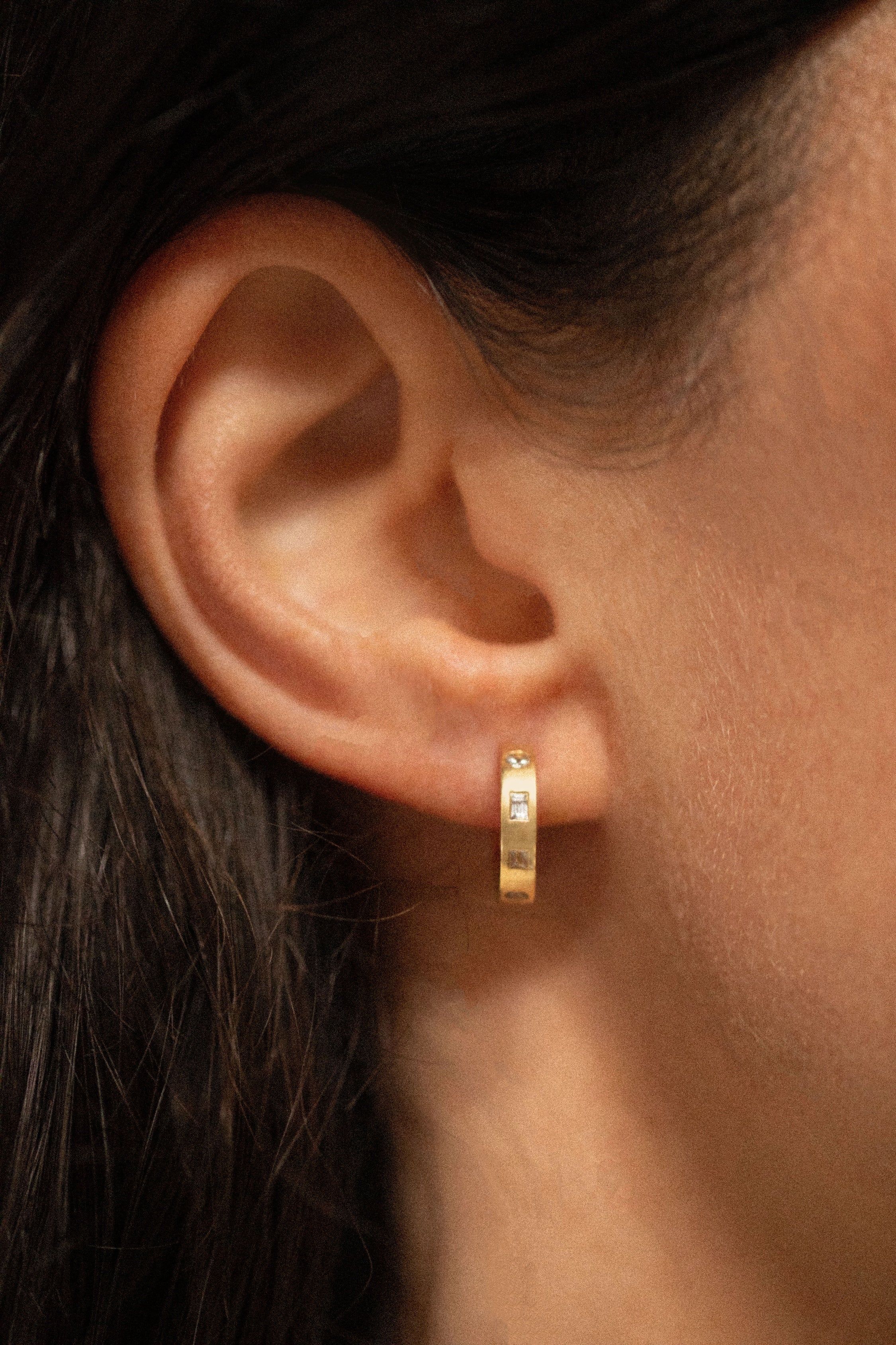 18K gold eternity huggie earrings worn— handcrafted gold huggies white sapphire— artisan jewelry — Sun Rae