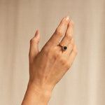 18K gold halo ring with diamonds and blue sapphire worn— handcrafted diamond halo ring — artisan fine jewelry — Sun Rae