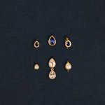 18K gold Sundrop sapphire earrings worn — White & Blue Sapphire — artisan handcrafted fine earrings — Sun Rae
