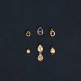 18K gold Sundrop sapphire earrings worn — White & Blue Sapphire — artisan handcrafted fine earrings — Sun Rae