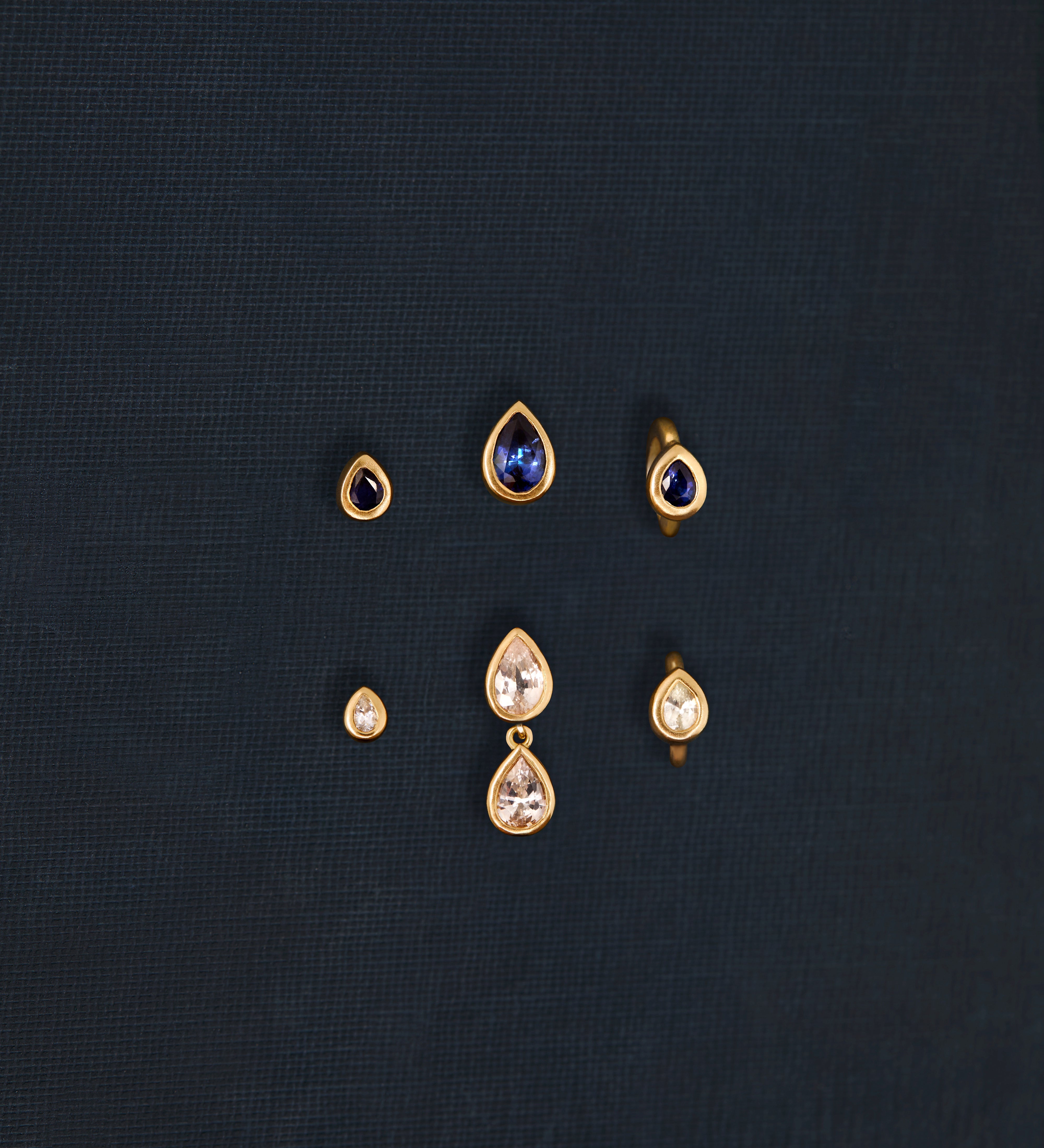 18K gold Sundrop sapphire earrings worn — White & Blue Sapphire — artisan handcrafted fine earrings — Sun Rae