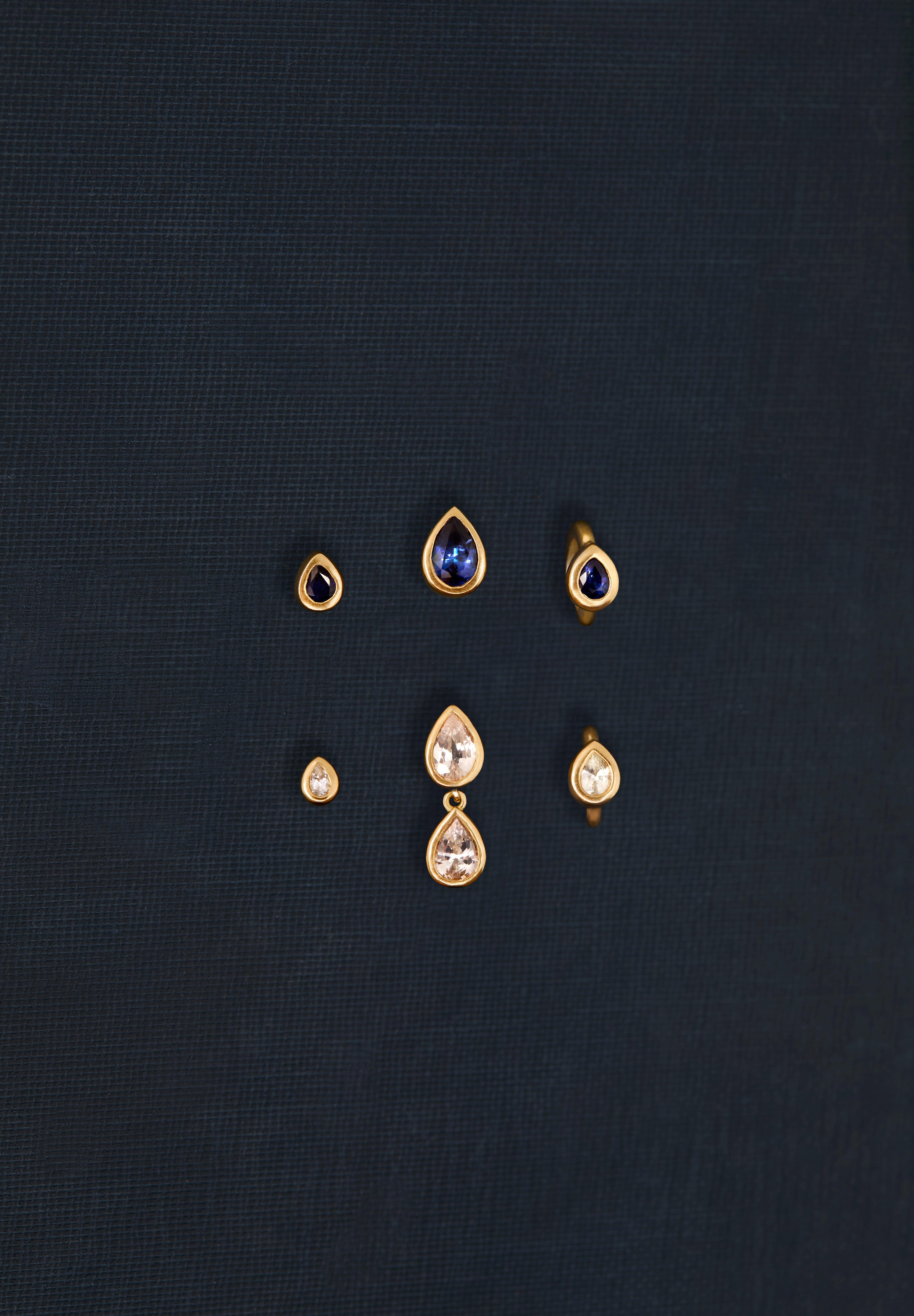18K gold Sundrop sapphire earrings worn — White & Blue Sapphire — artisan handcrafted fine earrings — Sun Rae