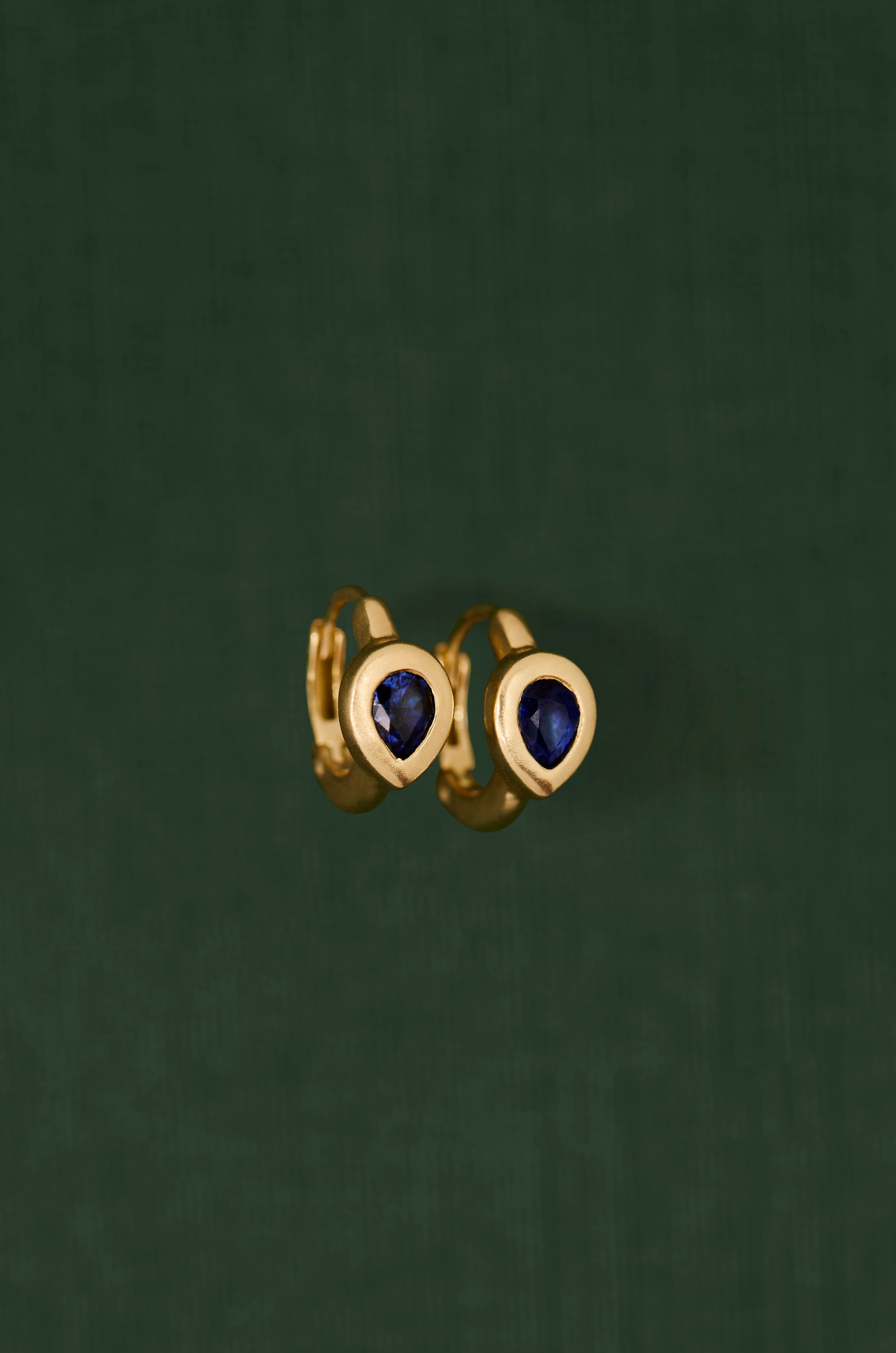 18K gold huggie earrings with blue sapphire — handcrafted gemstone earrings — Sun Rae