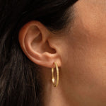 18K gold Sunseeker hoop earrings worn — handcrafted gold hoops — artisan jewelry Sri Lanka — Sun Rae