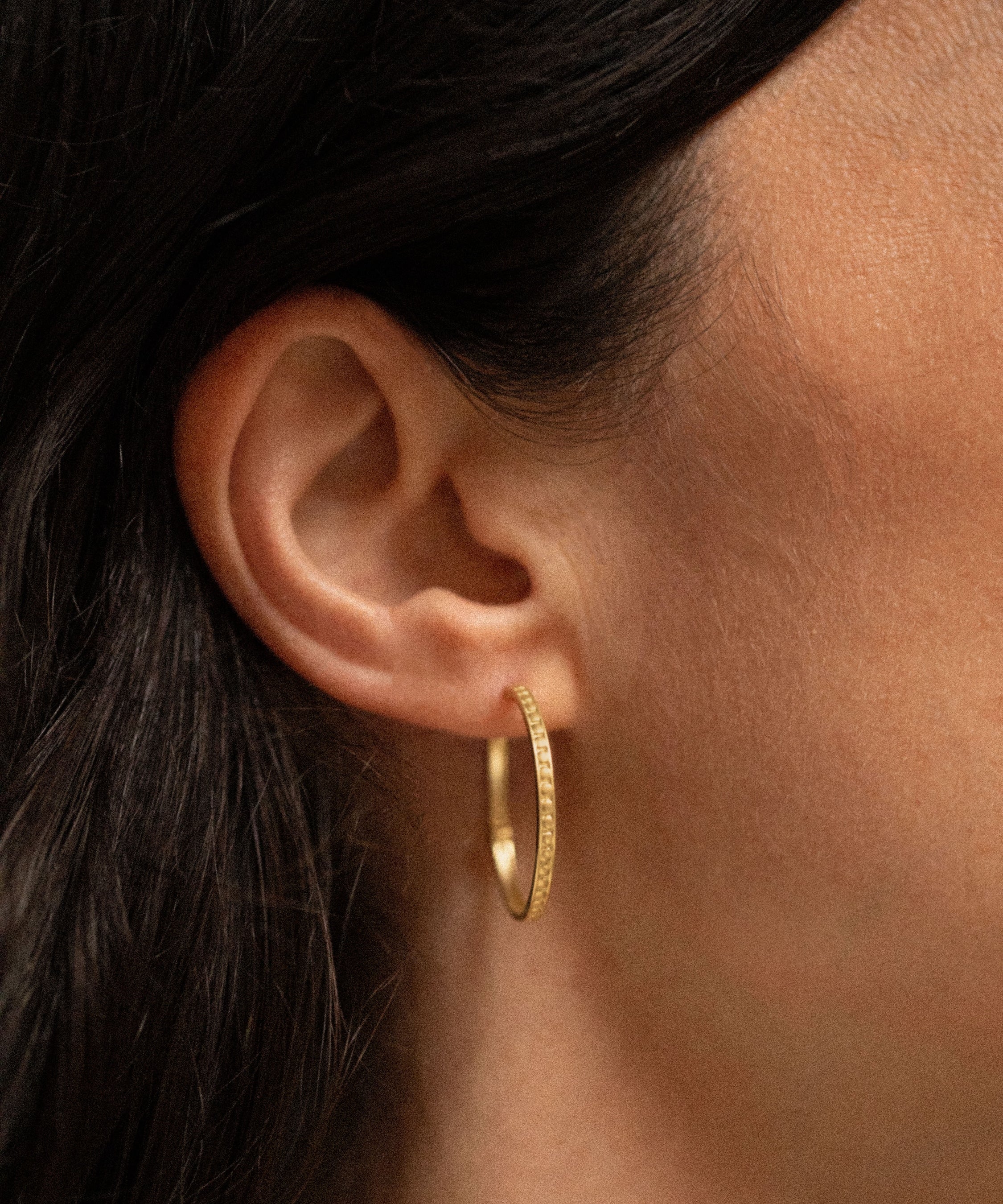 18K gold Sunseeker hoop earrings worn — handcrafted gold hoops — artisan jewelry Sri Lanka — Sun Rae