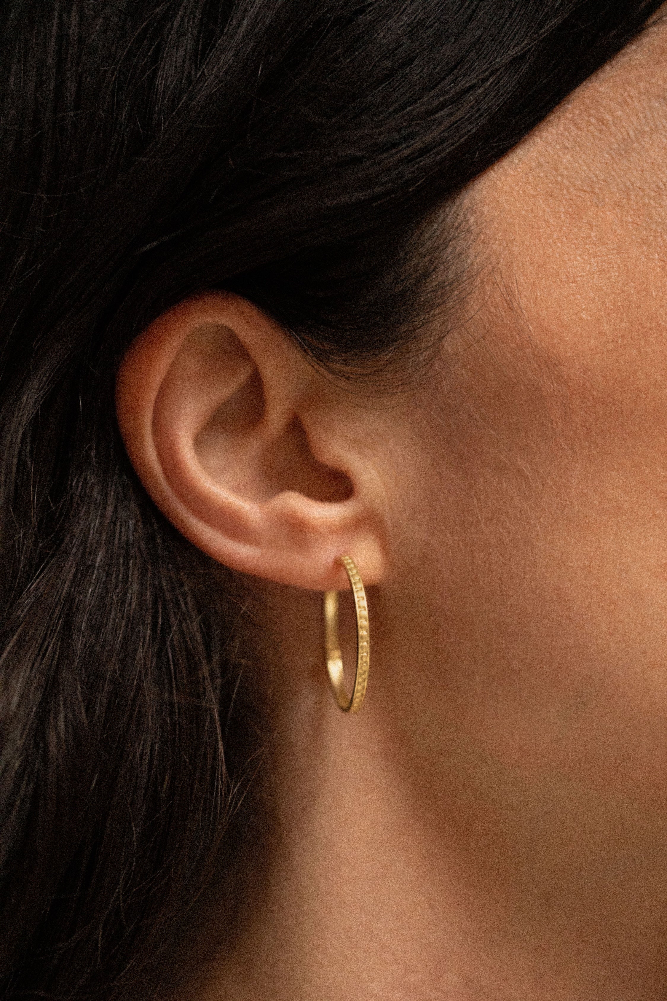 18K gold Sunseeker hoop earrings worn — handcrafted gold hoops — artisan jewelry Sri Lanka — Sun Rae