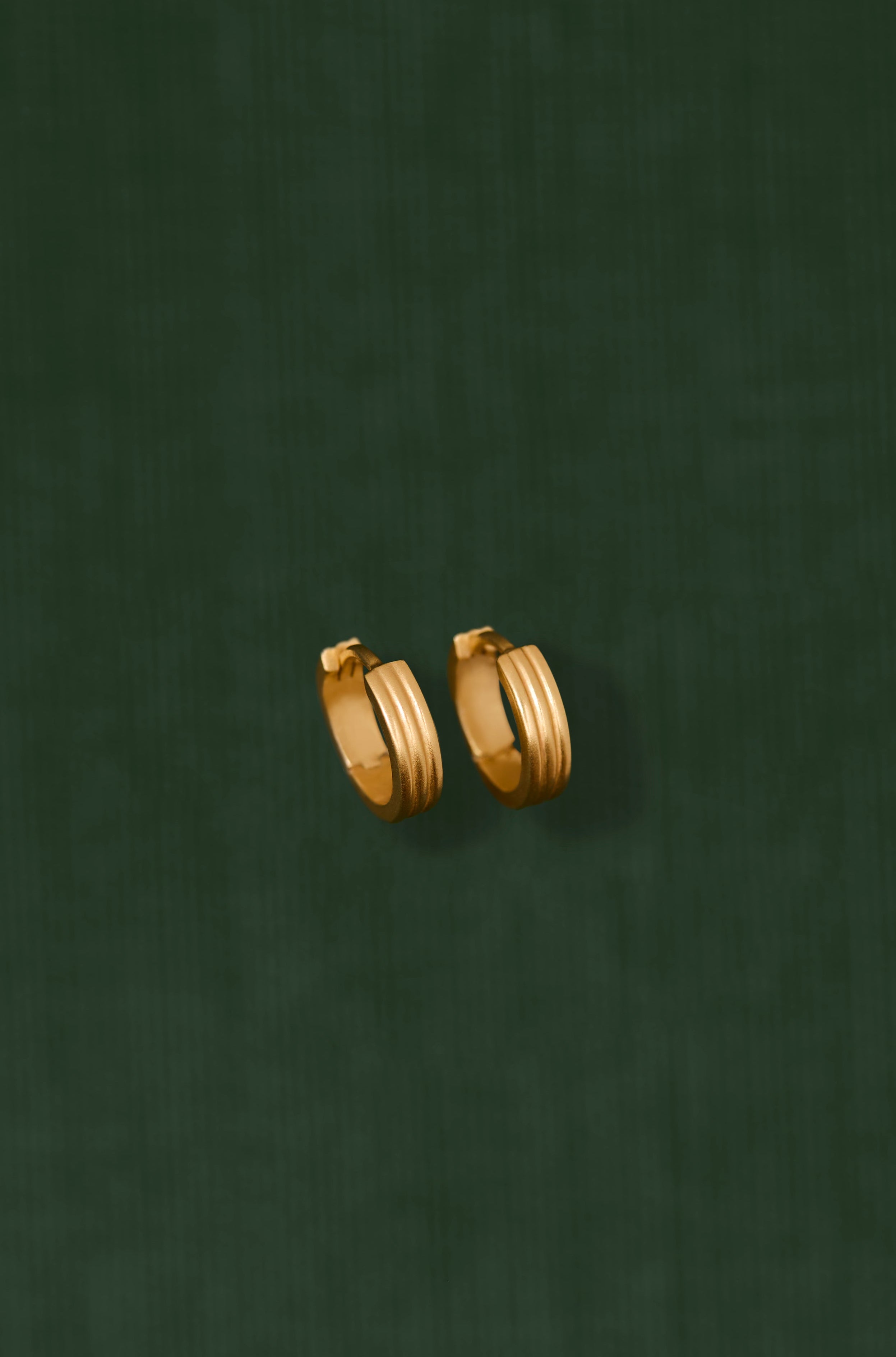 18K gold Trinity huggie earrings — handcrafted gold huggies — artisan jewelry — Sun Rae