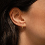 18K gold Trinity huggies worn — artisan handcrafted gold earrings — Sun Rae
